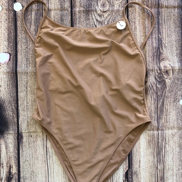NUDE Swimwear - Picture 1 of 4